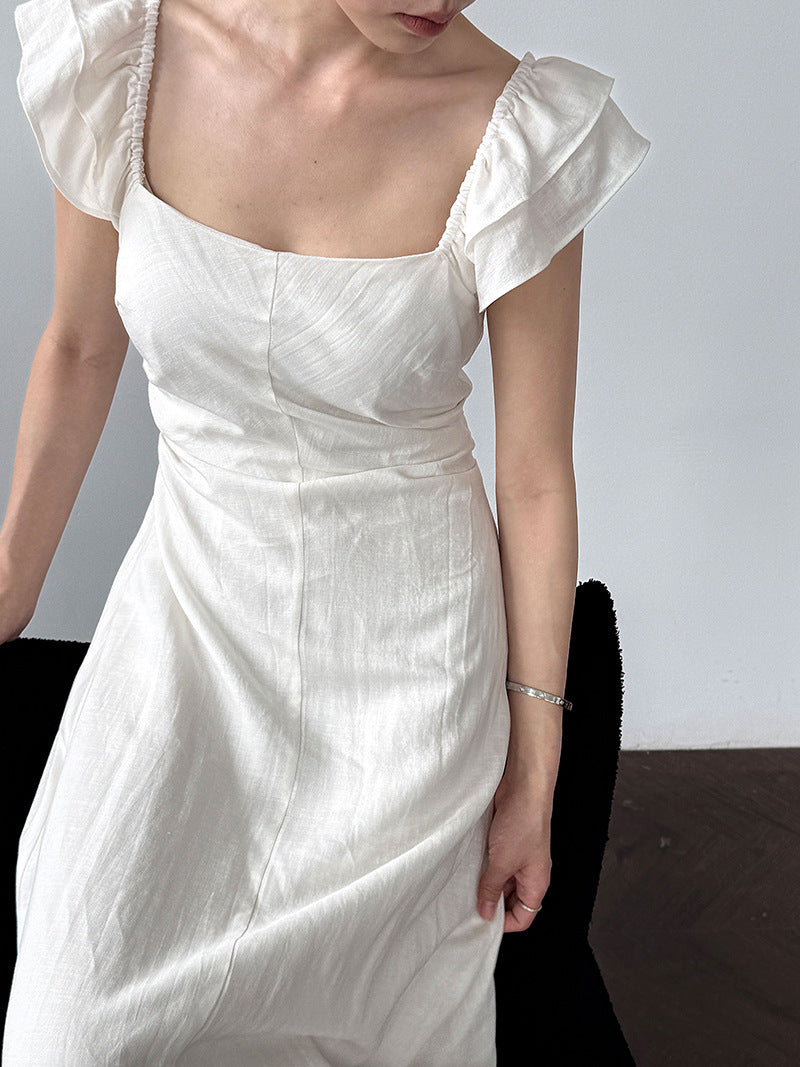 White flutter sleeve linen maxi dress with open back waist fit