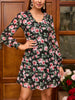 Flowy mini dress with floral print and tie neckline