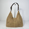 Woven straw tote bag for beach holidays