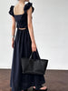 White flutter sleeve linen maxi dress with open back waist fit