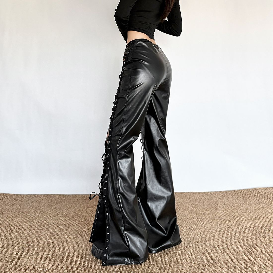 Flared faux leather pants lace up