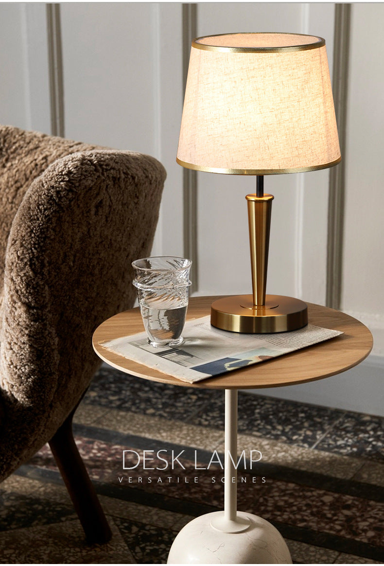 Modern Scandinavian brass table lamp with linen shade