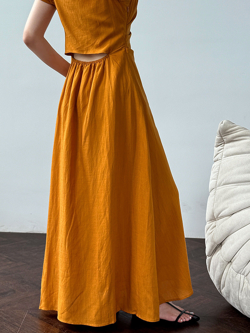 White flutter sleeve linen maxi dress with open back waist fit