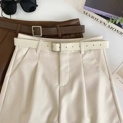 High waist faux leather belted shorts