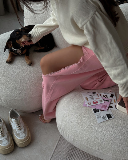 Pink distressed jeans with high waist and wide leg fit