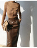 Brown sheepskin mid length bodycon leather skirt with slit