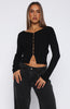black fitted button-up top with a v-neckline