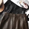 High waisted midi leather skirt with front slit and pockets