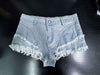 High waisted denim shorts with frayed light wash hem