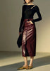 High waisted brown leather skirt crafted in genuine sheepskin. Midi to maxi length with slit and button detail. Premium leather skirts for women.