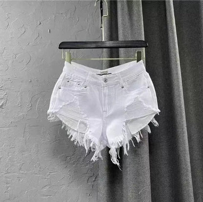Women ripped denim shorts with fringe