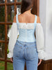 Blue floral camisole top with sheer bell sleeves
