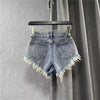Women ripped denim shorts with fringe