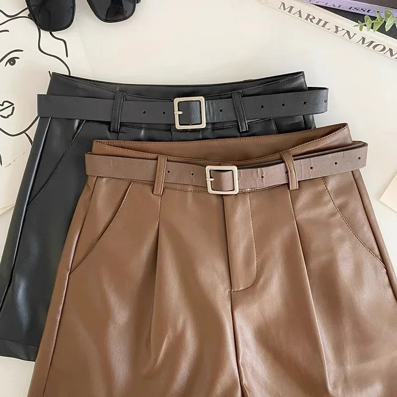 High waist faux leather belted shorts