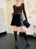 Black mini leather skirt for women featuring suede splicing and A-line cut. Perfect fit for trendy streetwear, work, or night outings.