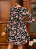 Flowy mini dress with floral print and tie neckline