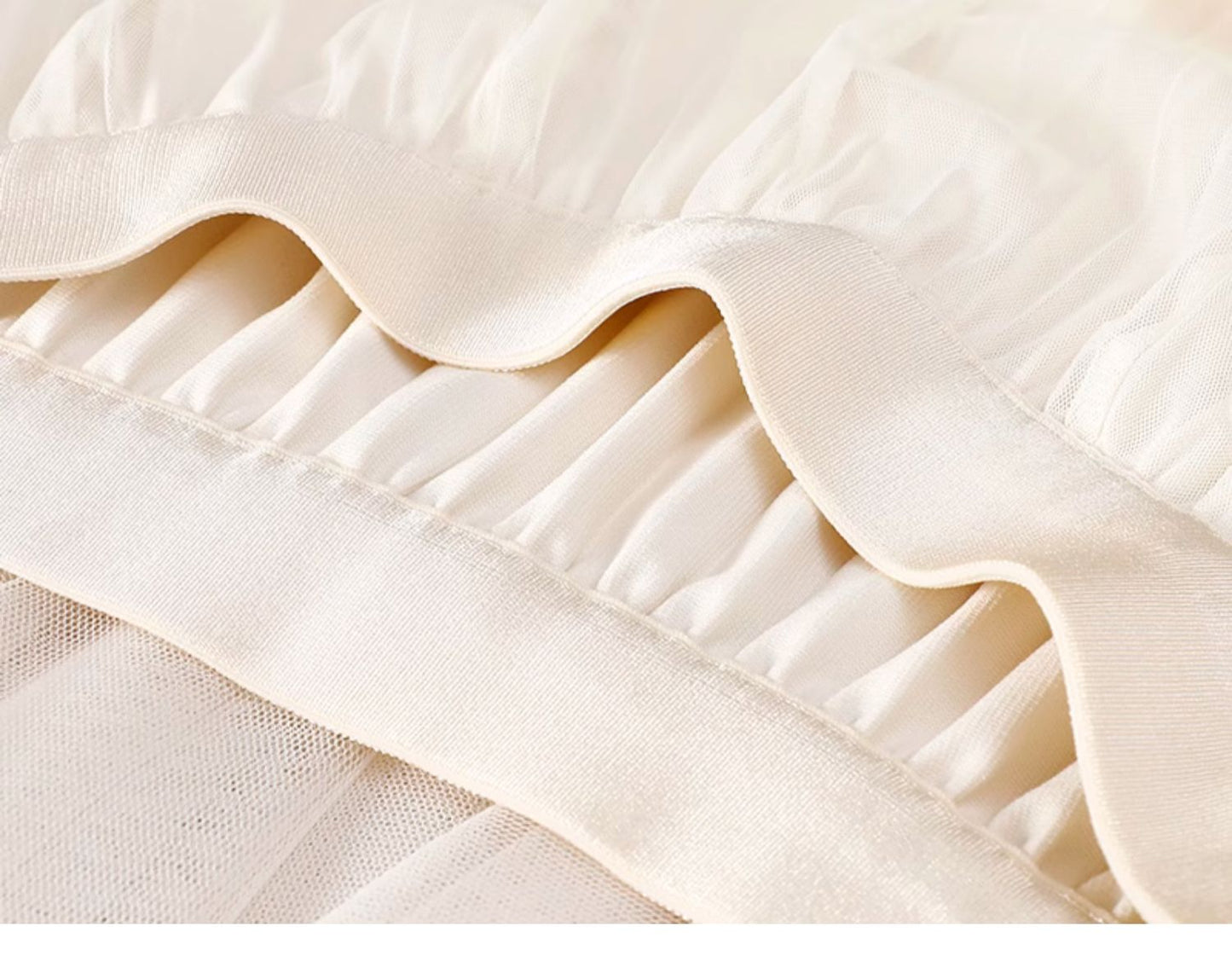 White pleated mesh skirt with elastic waistband