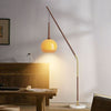 Vintage orb arching floor lamp with glass shade