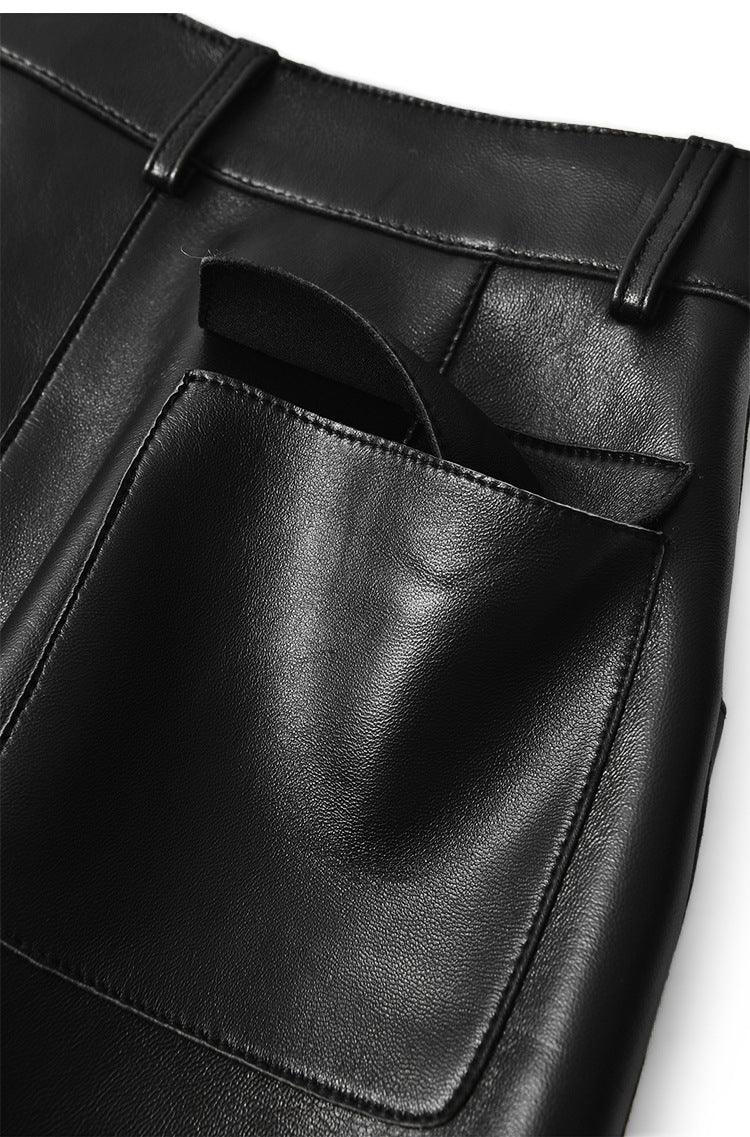 High waisted midi leather skirt with front slit and pockets
