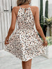Halter cocktail dress with smocked waist