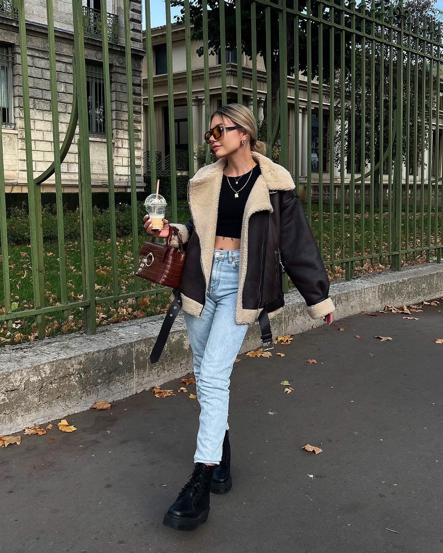 Brown shearling jacket with faux leather zip details