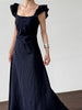 White flutter sleeve linen maxi dress with open back waist fit