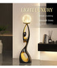 Artistic Resin Standing Light Sculptural Black and Gold Moon Floor Lamp