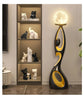 Artistic Resin Standing Light Sculptural Black and Gold Moon Floor Lamp