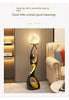 Artistic Resin Standing Light Sculptural Black and Gold Moon Floor Lamp