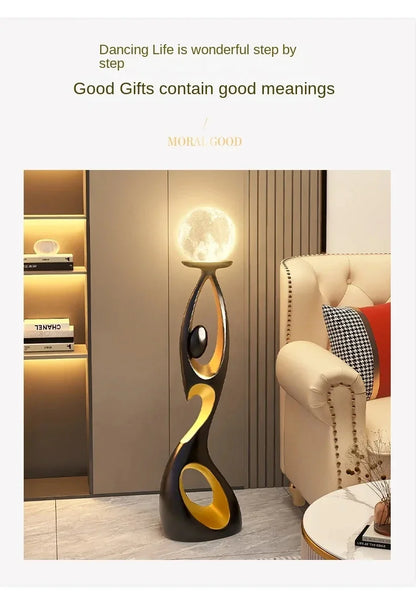 Artistic Resin Standing Light Sculptural Black and Gold Moon Floor Lamp