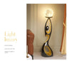 Artistic Resin Standing Light Sculptural Black and Gold Moon Floor Lamp