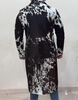 This long cowhide jacket showcases authentic black and white cowhide with a tailored fit. A bold cow fur trench coat ideal for rodeo life, ranch events, and cowgirl styling.

