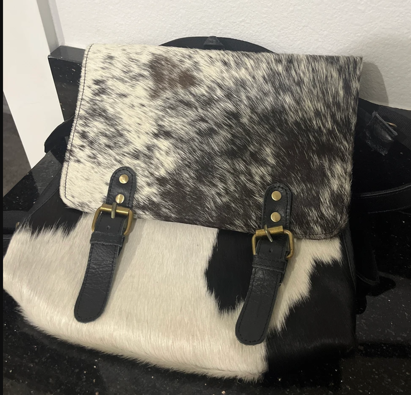 cowhide backpack purse black white