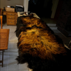 large black brown sheepskin rug