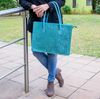 Turquoise hand tooled leather purse
