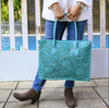 Turquoise hand tooled leather purse