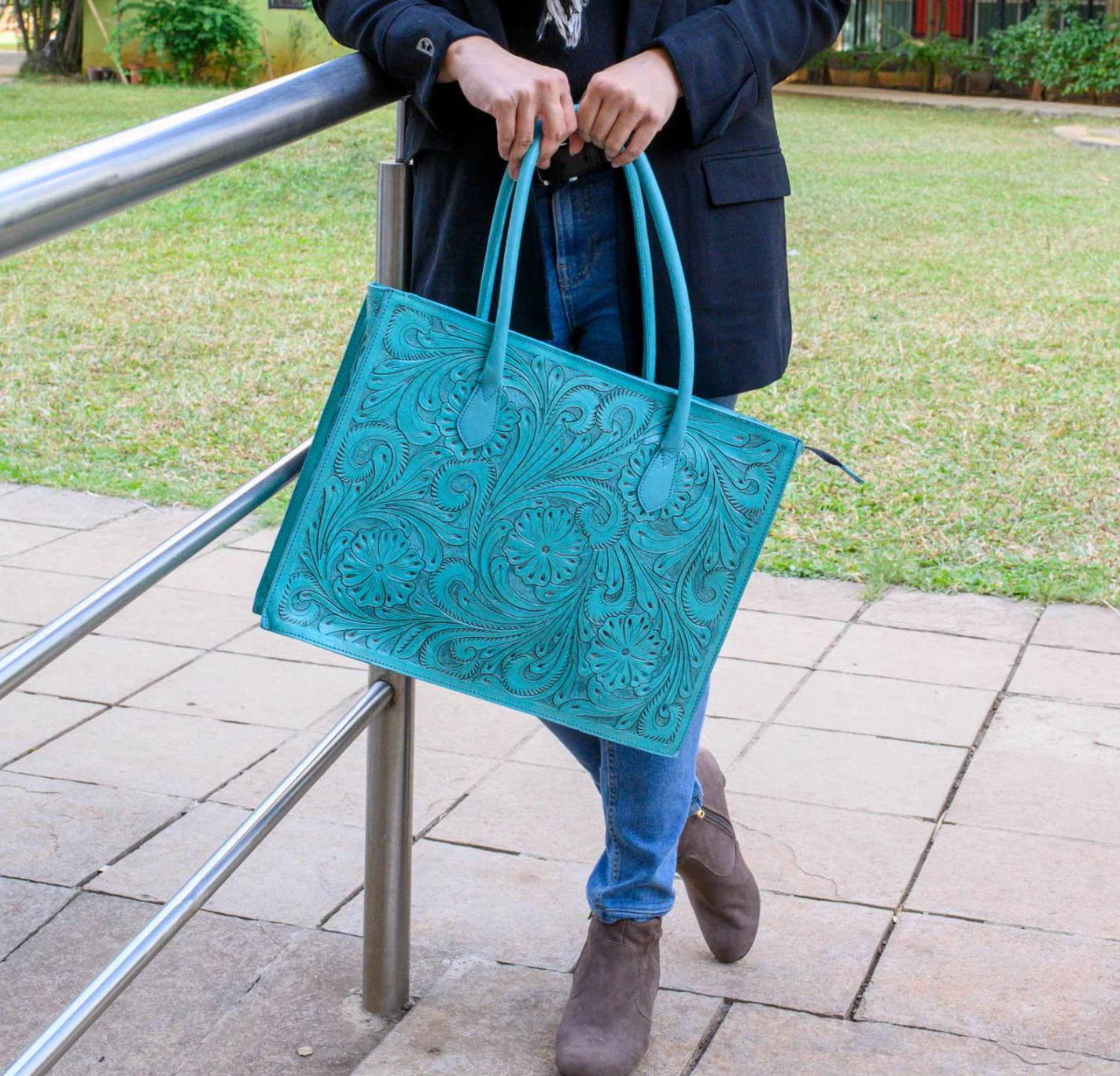 Turquoise hand tooled leather purse