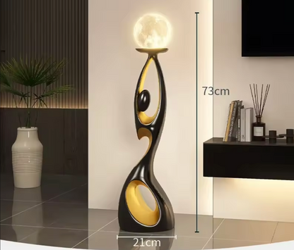 Artistic Resin Standing Light Sculptural Black and Gold Moon Floor Lamp