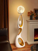 Artistic Resin Standing Light Sculptural Black and Gold Moon Floor Lamp