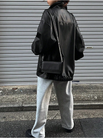 Oversized black leather jacket with drop shoulder
