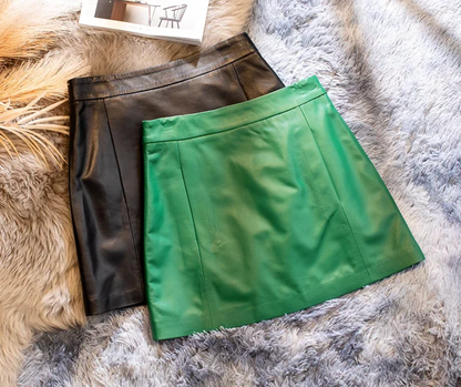 Women's mini leather skirt in black and green