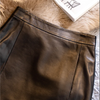 Women's mini leather skirt in black and green
