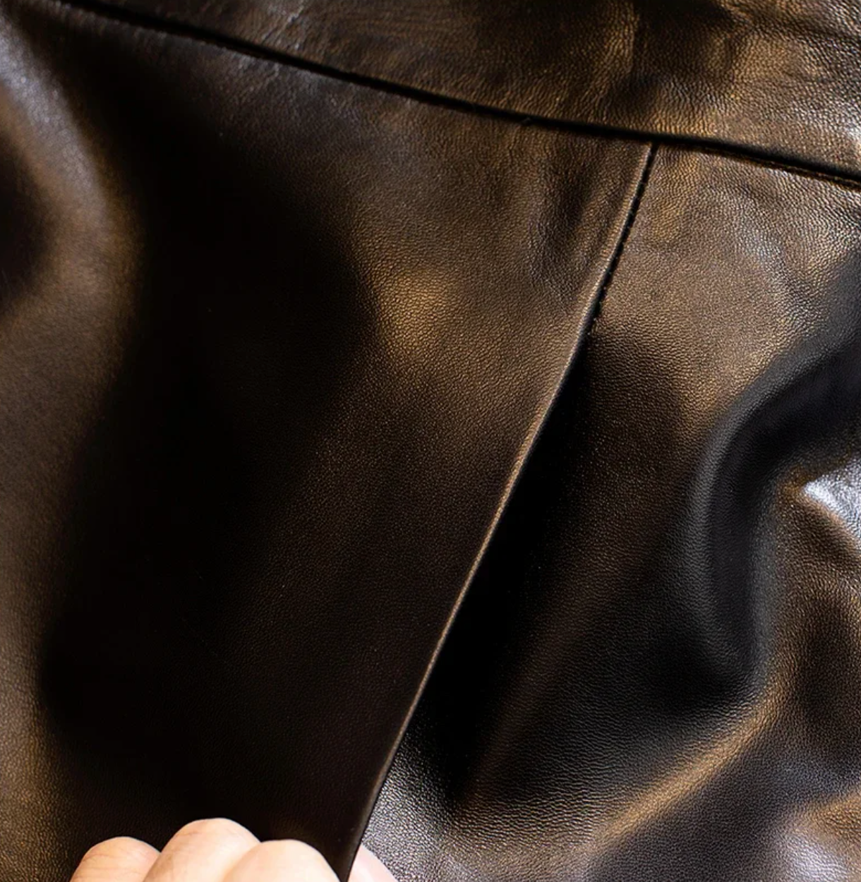 Women's mini leather skirt in black and green