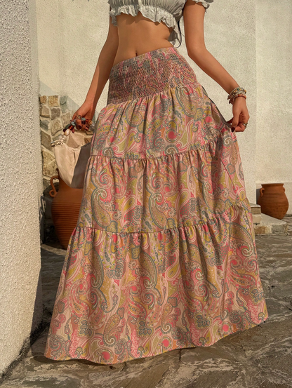 Smocked waist maxi skirt with tiered paisley print