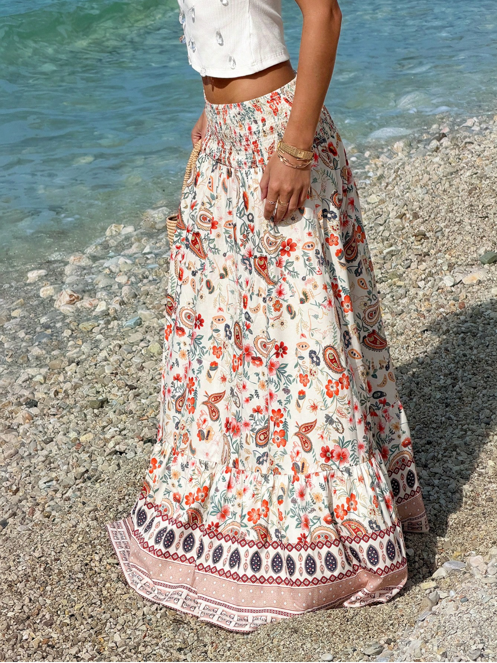 Smocked waist maxi skirt with paisley tiered hem