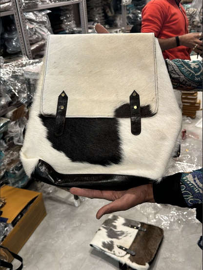 cowhide backpack purse black white