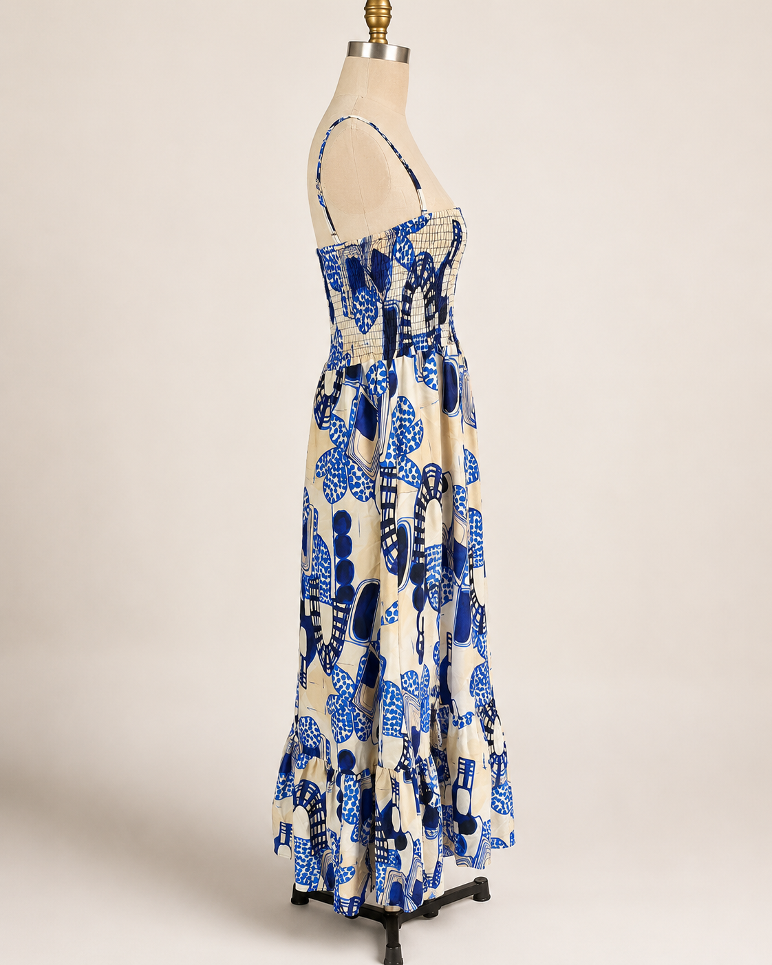 Smocked Back Blue Maxi Dress | Back view of the maxi dress showing the smocked rear bodice, open upper back, and adjustable thin straps.