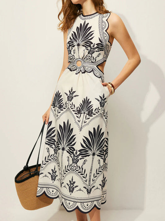 Tropical palm print midi dress with a sleeveless high neck, cutout waist and scalloped hem.
