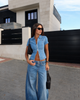Blue fitted denim shirt with short sleeves and two-way front zipper