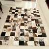 large cowhide patchwork rug